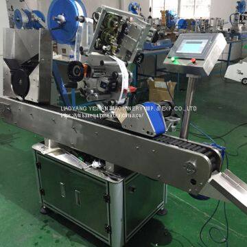 Horizontal labeling machine