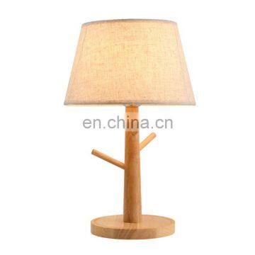 Simple and modern solid wood table lamp bedroom bedside pendant decoration Nordic wood art study LED warm table lamp