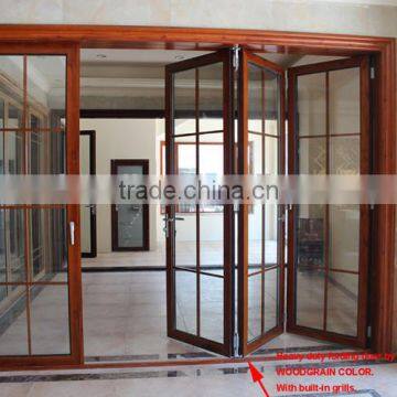 Wood color bi-fold screen door with grill design, custom make to client door size & design