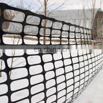 orange-red plastic safety fence, rolled orange plastic safety fence