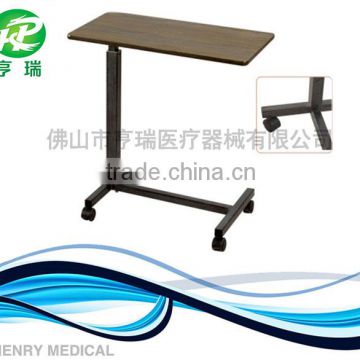 Steel adjustable over bed table with wheels