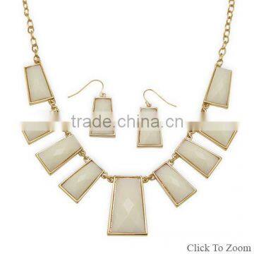 Gold Tone Fashion Necklace and Earring Set with Faceted Ivory Acrylic