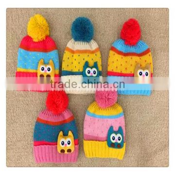 hot sale striated colorful winter knitted hat with owl decoration for kids ,with ball top