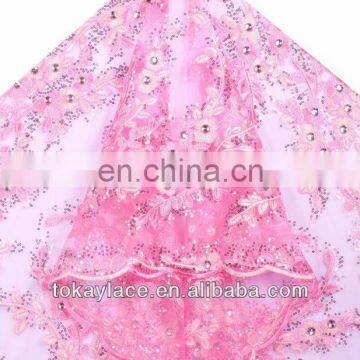 pink African french lace with net and stone for wedding