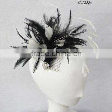 Gorgeous feather hair accessory with one brooch on comb