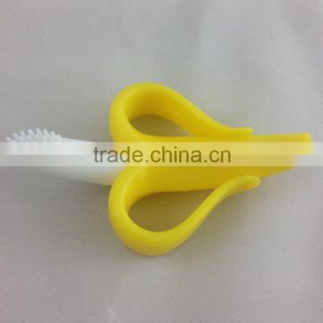 FDA hot sale silicone baby toothbrush, banana shape baby teether