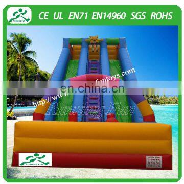 Inflatable double lane slide with arch