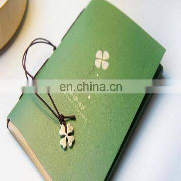 Competitive price customized creative kraft paper notebook /Lucky grass cover leather bound notebook