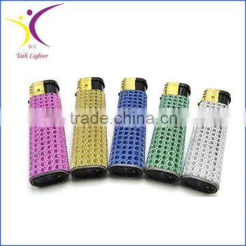 Silver match lighters colored with golden cap star lighter