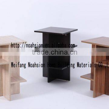 Small bookcase with many colours
