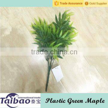 Plastic plant type the green maple leaf outdoor green plants