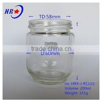 transparent glass jar with golden lid