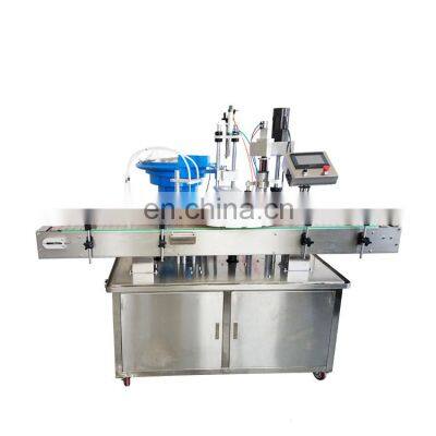 Automatic liquid filling machine with two head bottle filling capping and labeling machine