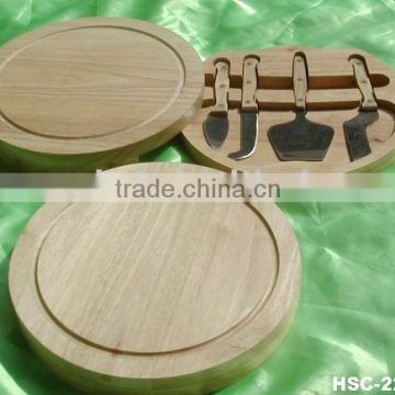 swivel-style circular cheese board with cheese knife set