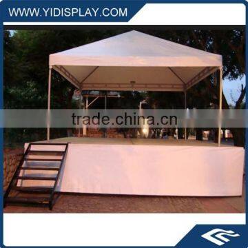 Outdoor event tent with portable stage platform