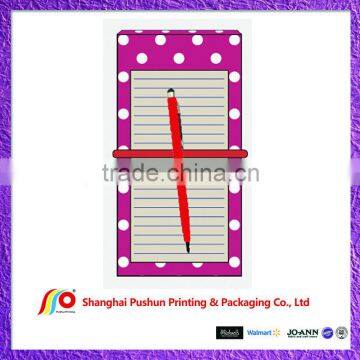 colorful notepad with pen