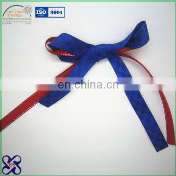 Red and blue curling ribbon for rhythmic gymnastics