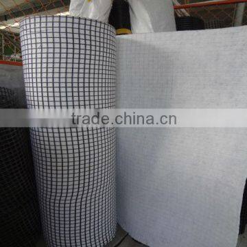 hot sale: fiberglass geogrid 50-50KN composite with geotextile