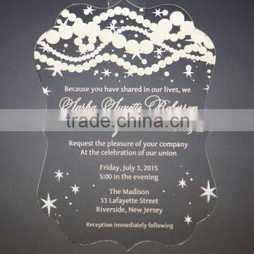 An elegant invitation fit for a princess complete with pearls and sparkles acrylic invitations