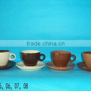 brown color stoneware cafe cup and saucer