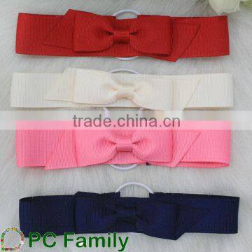 Gift packing ribbon bow with elastic loop at back