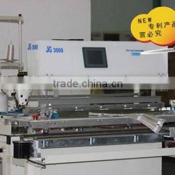 Automatic tucking sewing machine