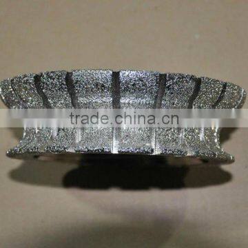 Vacuum brazed diamond polishing wheel for marble