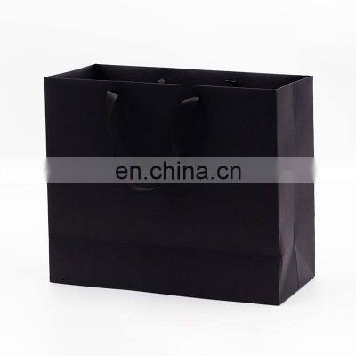 Luxury moisture proof custom black shopping paper gift packaging bag for sale