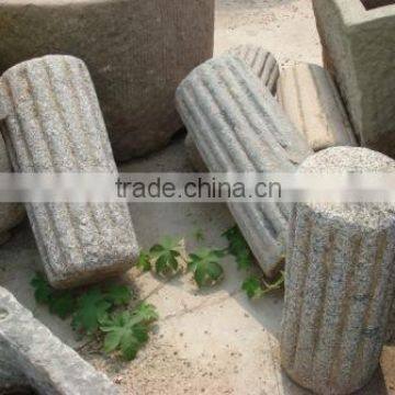 Antique granite millstone