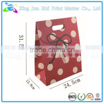 Cut out handle paper bag cheap shopping bags