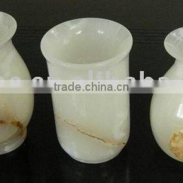 white flower stone vase