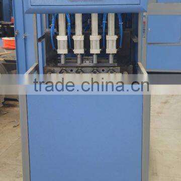 High Quality Semi Automatic 4 Cavities Drinking Water Bottle Blow Molding Machine photo-4
