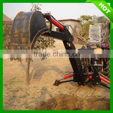 Garden tractor with LW-7 small backhoe loader