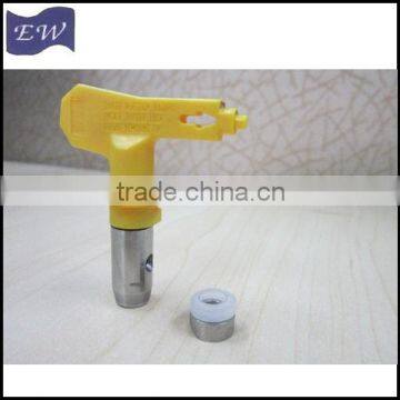 reversible tip for airless paint sprayer