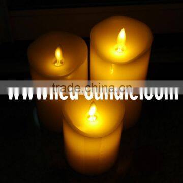 Movable flame wick candles