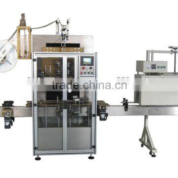 Milk bottle sleeve labeling machine and shrink tunnel