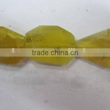 Wholesale yellow opal Tumbled flat loosen faceted gemstone manufacturer