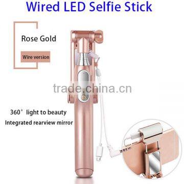 Bulk fom China Mini Monopod Wired Selfie Stick Cable with 360 Degree LED Light and Mirror