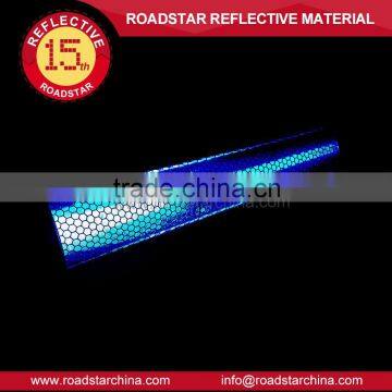 Conspicuous colorful prismatic reflective film