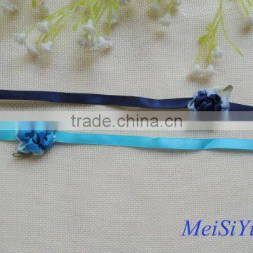 Handmade ribbon flower with ribbon loop for garment