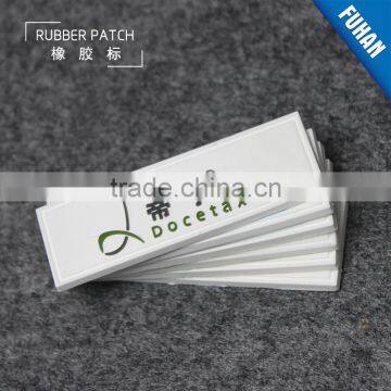 Embossed Custom White Background PVC Rubber Patch Logo photo-4