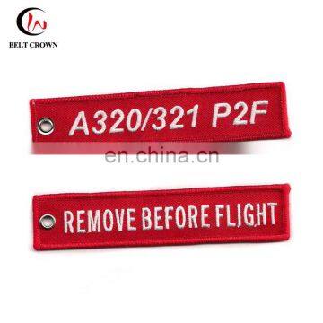 Remove before light embroidered key chain