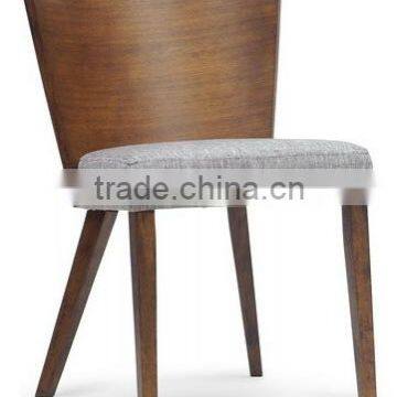 Wooden dining chair with a convex backrest