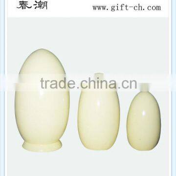 unpainted wooden easter eggs