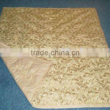 100% silk embossed quilt throw