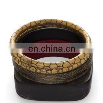 A Set of 4 Wood and Brass bangles Christmas Gift