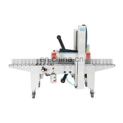 FXJ-5050Q Hualian Automatic Pneumatic Packaging Packing Sealer Carton Sealing Machine