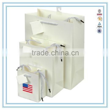 Alibaba china custom white luxury paper bag & brand paper bag printing logo with handles