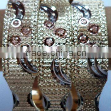 Ladies Laser cut gold plated bangles