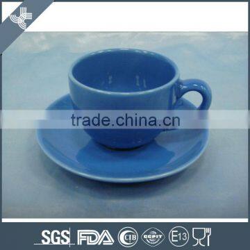 whole sale blue color ceramics coffee cup and saucer with roll shape